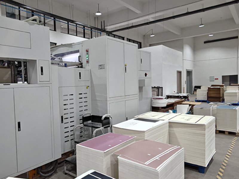Bugu packaging factory printing workshop in China with automated machines producing custom paper bags and packaging boxes